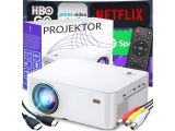 une photo d'un projecteur avec une télécommande et un coffret de films