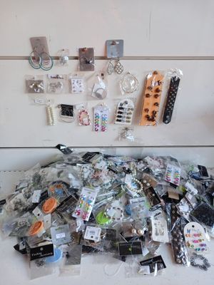 a pile of assorted items sitting on the floor