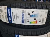 two tires are stacked on top of each other in a store