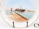 a plate with a picture of a ship on it