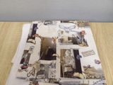 a pile of papers with pictures on them on a table