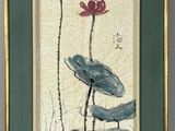 framed picture of a painting of two flowers and a bird on a pond