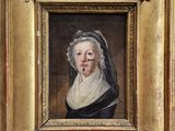 an old painting of a woman in a black dress with a veil