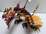 a toy dragon that is sitting on a table