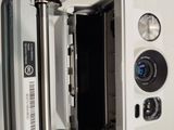 a picture of an open cell phone with a camera attached to it