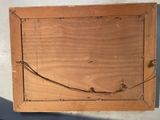 a picture of a piece of wood with a wire on it