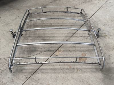 an image of a metal bed frame on a concrete floor