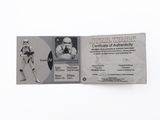 a close up of a star wars id card on a white surface