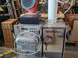 a machine that is sitting on a pallet in a warehouse