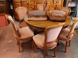 many chairs and a table in a room