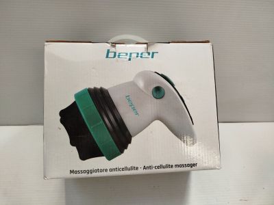 a box with a white and green blow dryer inside of it