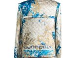 the jacket is blue and white with a pattern on it