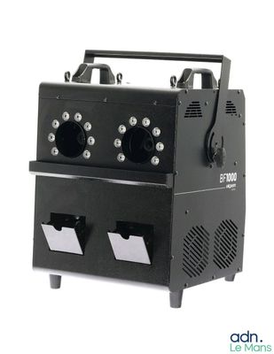 une image représentant une machine noire surmontée de quatre lumières