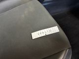 the back seat of a car with a sticker on it