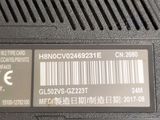 a label on the back of a laptop that reads hndcv23331e