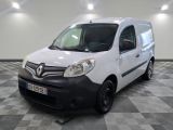the white van is parked on a checkered floor in a room
