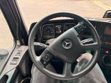 a steering wheel and dashboard of a truck