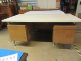 an image of a desk in a room with a lot of furniture