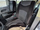 a seat in the back of a van that is empty