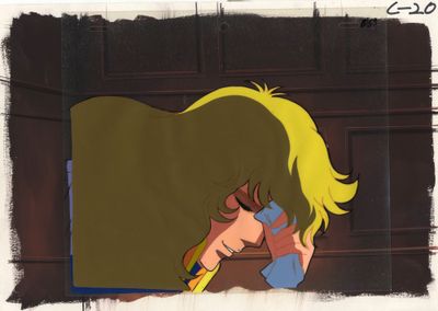 cellule d'animation représentant une femme aux cheveux blonds portant un t-shirt bleu