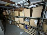 many boxes on the shelves in the room