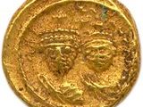 une pièce d'or sur laquelle est représentée la tête d'une femme