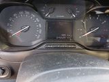 a close up of a car dashboard with a speedometer and gauges