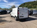 a white van that is parked in a parking lot