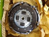 a close up of a clutch plate in a box