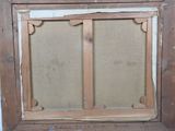 an old picture of a window frame with a picture of a cat in it