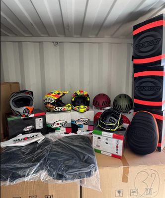 a box with a bunch of helmets on top of it
