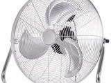 une image représentant un ventilateur blanc posé sur un support métallique