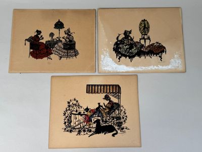 three framed pictures of people sitting at a table in a room
