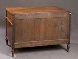 an old wooden chest with two doors and a drawer
