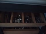 many spoons and spoon knives in a wooden drawer