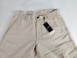 a close up of a pair of shorts with a tag on it