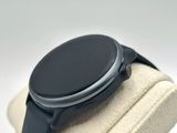 a smart watch sitting on top of a display case