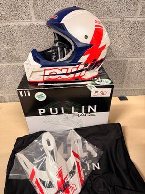 the helmet is sitting on top of the box on the table