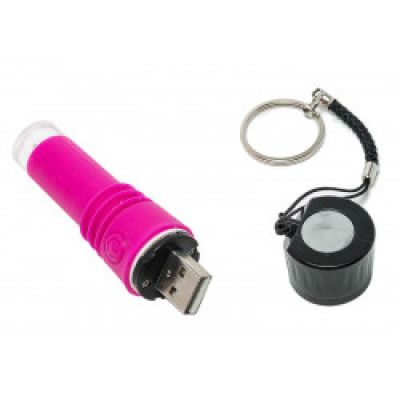 a pink flashlight and a keychain on a white background
