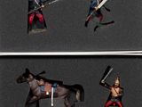 trois figurines représentant un homme à cheval et un homme à cheval muni d'une épée