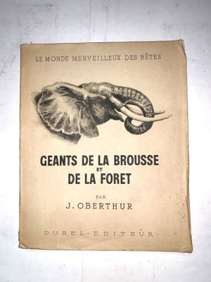 an old book with a picture of an elephant on it