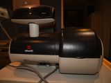 a black and white blender sitting on top of a white counter