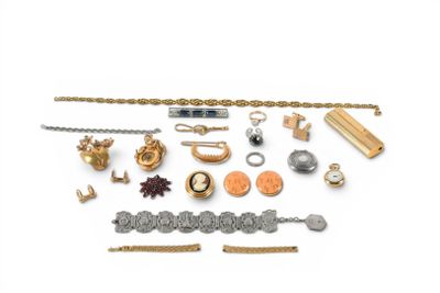 an assortment of gold and silver jewelry on a white background