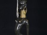 an image of a statue of a woman with a vase on her head