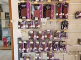many different types of hair products on display in a store