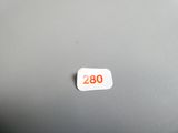 a sticker with the number twenty on it sitting on a laptop