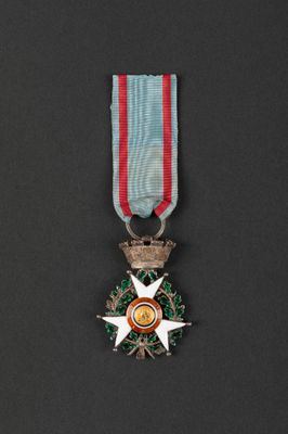 a close up of a medal on a black surface