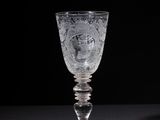 a close up of a glass cup on a table