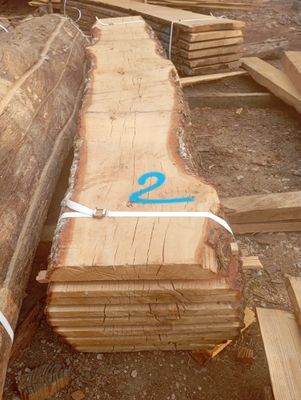 several pieces of wood are stacked on top of each other in a pile