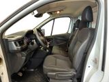 the interior of a white van with the door open and the driver ' s seat down